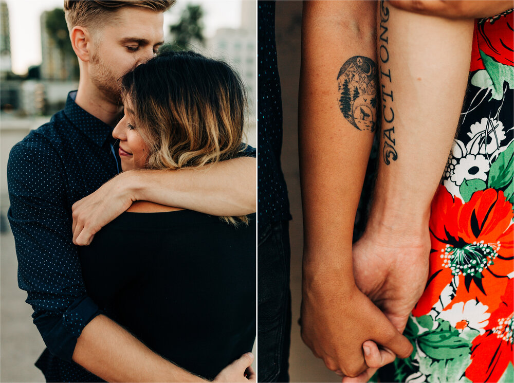 Fun couple with tattoos wrapped up with each other